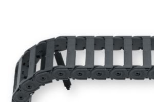 The QT0250-030-030 black plastic Cable Carrier chain with circular joints is shown curving to the left against a white background.